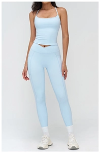 Détails du legging de yoga à taille haute croisée avec poches latérales pour téléphone
