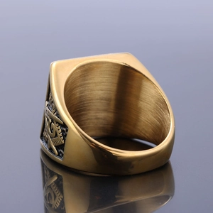 Vintage gold masonic ring with AG logo and black gemstone emblem in stainless steel