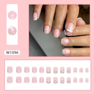 Short square light pink press-on nails with white French tips and small flower patterns