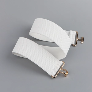 Detail of white elastic waist belt featuring high-stretch webbing and gold metal buckle