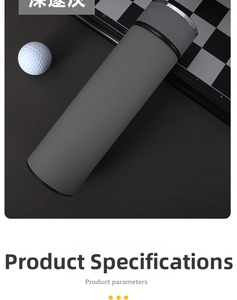 Close-up of matte deep gray smart thermos lid with metal trim on a dark premium desk