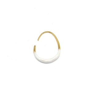 Detailed close-up of U-shaped gold earrings with white marble enamel inlay
