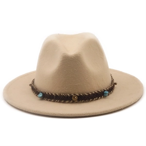Detail of bohemian wool fedora with woven band, turquoise beads and metallic studs