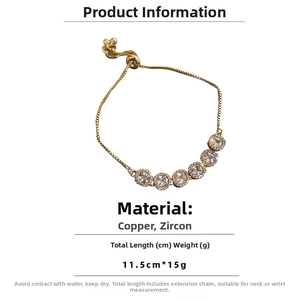 Macro view of adjustable gold bolo bracelet with square-cut zirconia inlay details