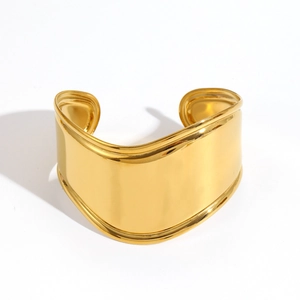 Bracelet jonc large en acier inoxydable doré 18k avec design vague irrégulière