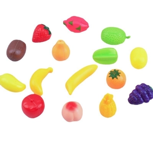 Miniature dollhouse fruit models set with assorted plastic toy fruits on white background