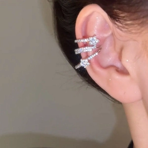 Star zircon multi-layer ear cuff with silver plating for non-pierced ears on model