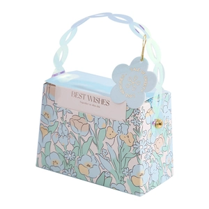 Pink floral wedding favor box with holographic handle and floral tags for candies