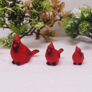 Set of three resin cardinal figurines with realistic feather texture for Christmas decor