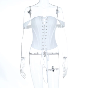 Detail of white off-shoulder corset top with lace-up front and metal eyelet details