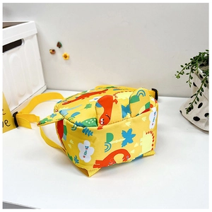 Detail of yellow dinosaur kid backpack with 3D fins and adjustable padded straps