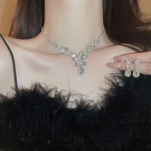 Luxury water drop floral pendant necklace and earring set with crystals on model