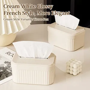 French cream-style tissue box with vertical stripes and glossy white lid
