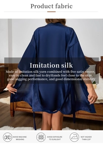 Detail of dark blue faux silk robe showing five satin weave fabric and drape quality