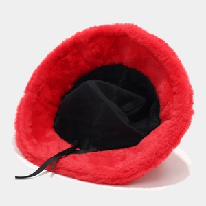 Detail view of red faux rabbit fur bucket hat with adjustable black inner drawstring