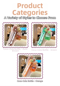 Detail of soda bottle keychains with colorful silicone wristbands and gold bells