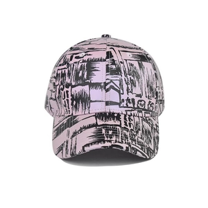 Detailed front view of pink tie-dye baseball cap with black abstract graffiti prints