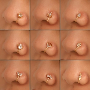 9pcs set of gold-colored non-pierced U-shaped nose rings with diverse zircon-inlaid charms