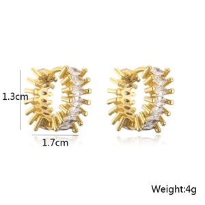 Detail view of gold earrings with marquise-cut zircons showing 1.3cm x 1.7cm dimensions