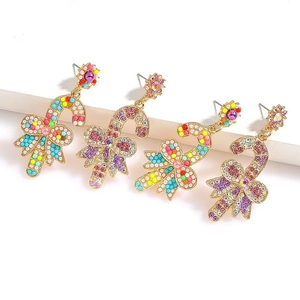 Christmas candy cane drop earrings with colorful rhinestones and gold bow accents