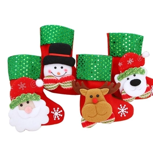 Set of 4 festive Christmas stockings with sequin trim featuring Santa, Snowman, Deer and Bear