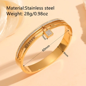 Titanium steel gold bangle with geometric patterns and sparkling square diamond lock charm