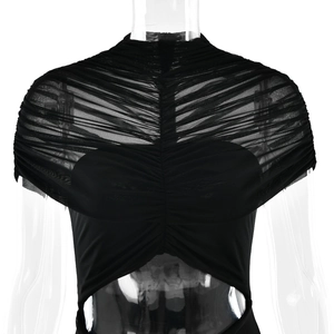 Detail view of black ruched mesh top featuring a stylish cut-out waist design