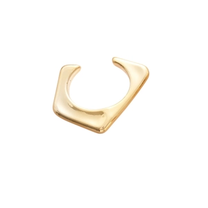 Irregular geometric gold open cuff bracelet with a polished minimalist aesthetic