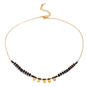 Elegant gold stainless steel necklace with black beads and round pendant charms