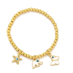 Gold beaded stretch bracelet with elephant, starfish and butterfly charms and evil eye details