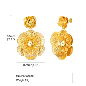 Detail showing dimensions and 23g weight for golden copper flower drop earrings