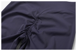 Detail shot of scrunch butt seam and high waistband on recycled yoga flare pants