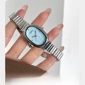 Detail of Gedi women's quartz watch with oval silver case and light blue pearlescent dial