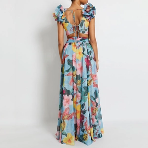 Ensemble floral deux pièces avec haut à volants dos nu et jupe longue taille haute