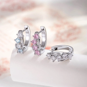 Polished silver 316L stainless steel geometric hoop earrings with blue, pink and clear stones
