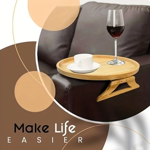 Bamboo sofa armrest tray in natural wood finish with foldable round drink holder