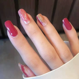 Deep red and gold marble nail stickers with long square shape for a stylish manicure