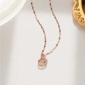 Elegant rose gold swan necklace with sparkling zircon crystals and a floating center stone