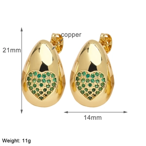 Detail view of gold earrings featuring green zircon hearts with 21mm height and 11g weight