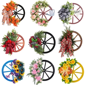 Christmas wagon wheel wreath collection with pine cones and floral festive decorations