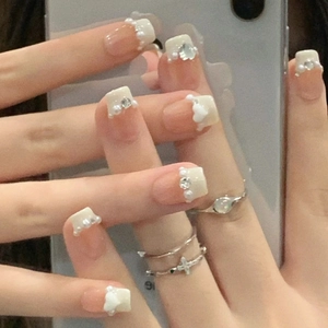 Short French square press-on nails in milky white with 3D hearts and pearl accents