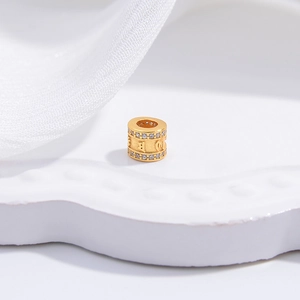 Gold-plated S925 silver cylinder bead with cubic zirconia and engraved symbols for DIY jewelry