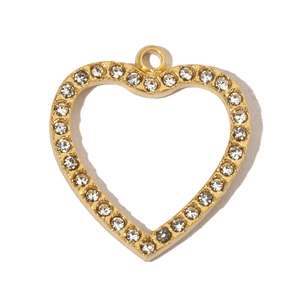 Close-up of gold heart pendant with hollow design and paved white crystals
