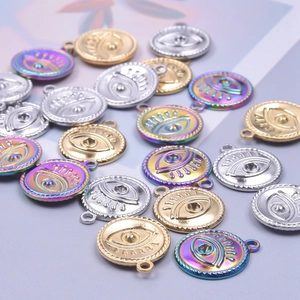 Golden and silver stainless steel evil eye round pendants in various metallic colors