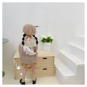 Chic unicorn sequin waist bag for girls styled with knit vest and pleated skirt