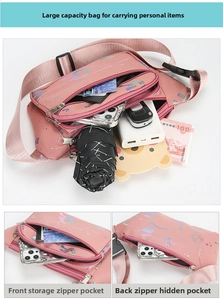 Detail of pink oxford waist bag showing multi-layered compartments and spacious capacity