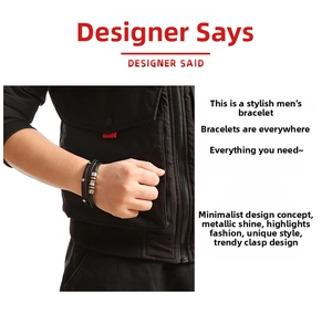 Detail of a men's multilayer black braided leather bracelet with silver and gold metal rings