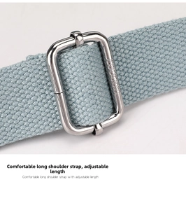 Detail of adjustable nylon shoulder strap with silver metal buckle for crossbody bag