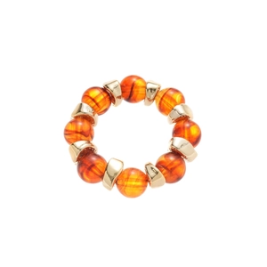 Chic amber acrylic beaded bracelet with golden metal spacers on white background