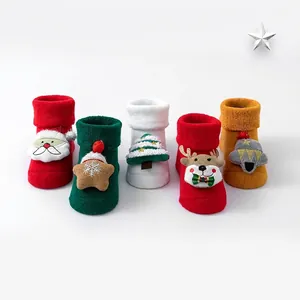 Five pairs of warm cotton baby Christmas socks with 3D festive plush doll ornaments